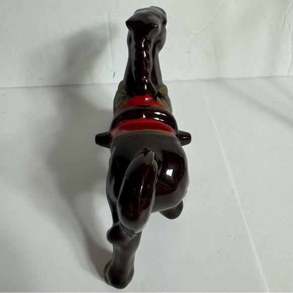 Vintage small brown ceramic horse figurine featuring gold trim and a red saddle. - Picture 7 of 10